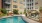 swimming pool with spacious seating areas and reclining chairs